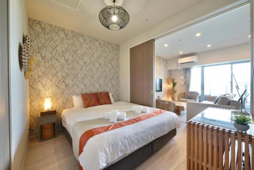 Ένα ή περισσότερα κρεβάτια σε δωμάτιο στο Branchera Naha Akebono Premist R68