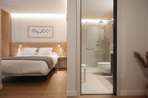 Ένα μπάνιο στο Apartamentos JOAQUÍN COSTA