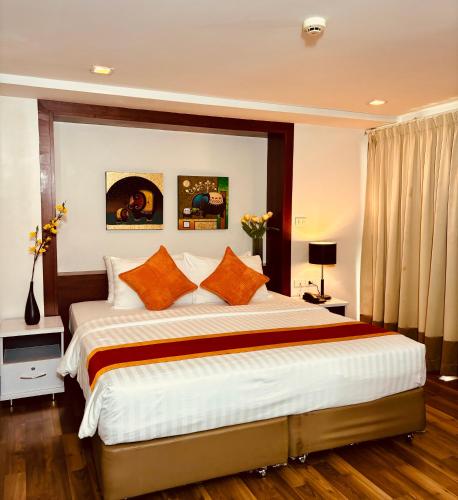 Ένα ή περισσότερα κρεβάτια σε δωμάτιο στο I Residence Hotel Sathorn