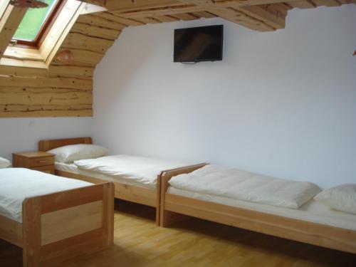 Postel nebo postele na pokoji v ubytování Farmstay Hiša Pečovnik