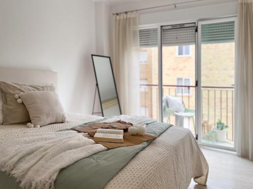 Ένα ή περισσότερα κρεβάτια σε δωμάτιο στο ArañueloHomes
