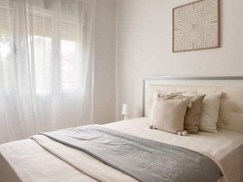 Ένα ή περισσότερα κρεβάτια σε δωμάτιο στο ArañueloHomes