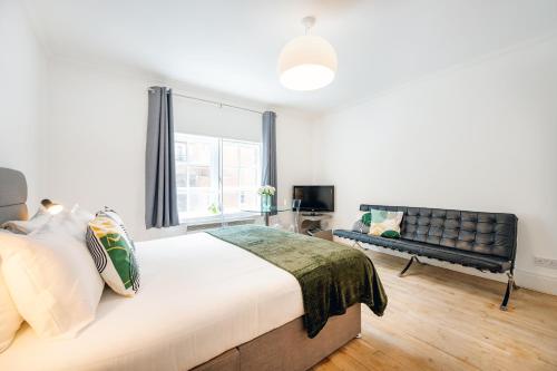 Ένα ή περισσότερα κρεβάτια σε δωμάτιο στο Welcome London - Short's Gardens