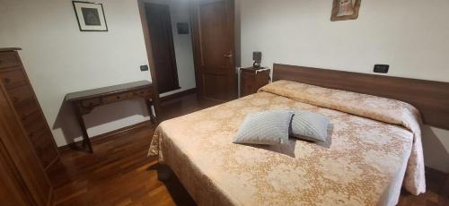 Postel nebo postele na pokoji v ubytování Casa Ausonia