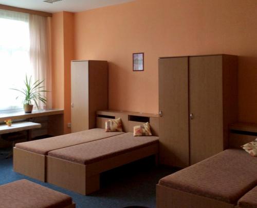 Postel nebo postele na pokoji v ubytování penzion FIT