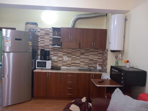 Kuchyň nebo kuchyňský kout v ubytování APARTAMENT APOLONIA 3 CAMERE CU VEDERE LA MARE a40