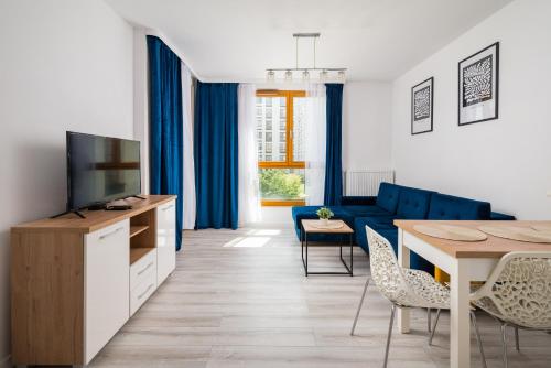 Wola Pleasant Apartment by BookingHost