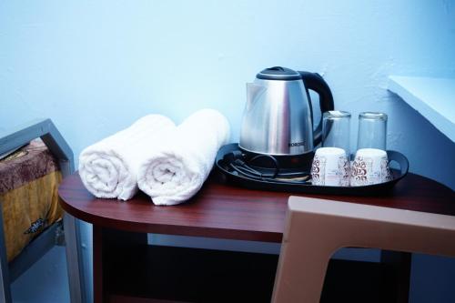 Facilități de preparat ceai și cafea la Aalaya Homestay
