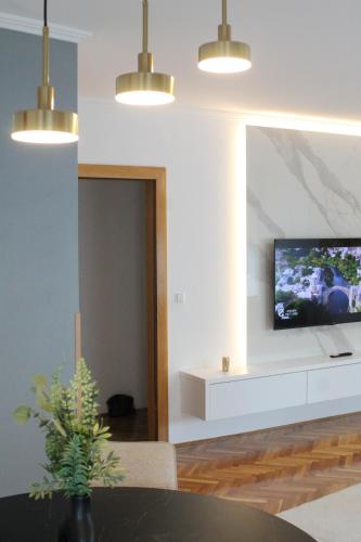 TV a/nebo společenská místnost v ubytování Dream View Apartments