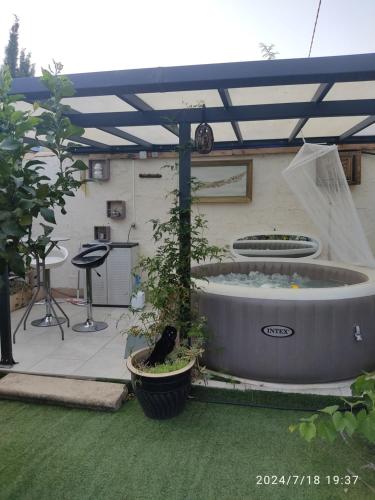 Studio climatisé avec spa privatif