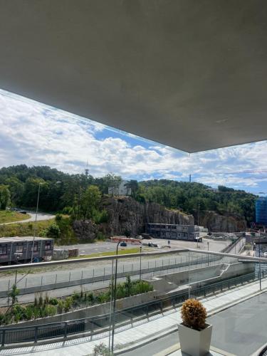 a view of a highway from a window of a building at Møblert ferieleilighet i det fineste stedet i byen in Kristiansand