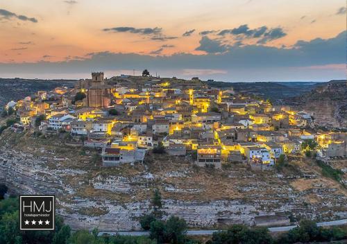 an aerial view of a city at sunset at Hotel Spa Mirador in Jorquera