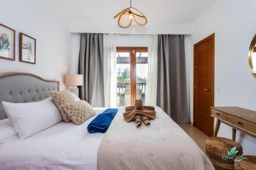 Postel nebo postele na pokoji v ubytování Casa Familia