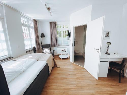 Katil atau katil-katil dalam bilik di Fachwerk Hotel Wuppertal