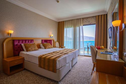Postel nebo postele na pokoji v ubytování Örsmaris Boutique Hotel