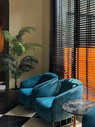Χώρος καθιστικού στο HOTEL le JARDIN SECRET saigon