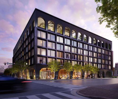 a large black building with a lot of windows at Hotel Bourre Bonne Louisville, Curio Collection by Hilton in Louisville