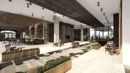 a rendering of the lobby of a building at Hotel Bourre Bonne Louisville, Curio Collection by Hilton in Louisville