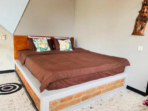 Cama o camas de una habitación en Sigiri Lake Paradise