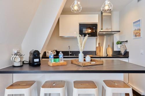 Kuchyň nebo kuchyňský kout v ubytování OIQIA • Intemporel