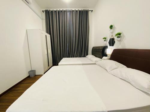 Ένα ή περισσότερα κρεβάτια σε δωμάτιο στο Alyn Home Muar