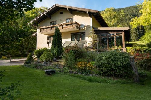 a house with a garden in front of it at Ferienhaus Schlager in Puchberg am Schneeberg in Puchberg am Schneeberg