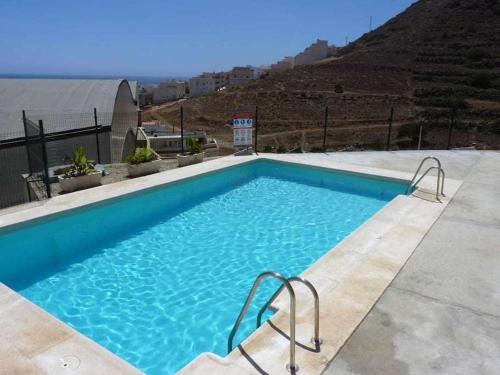 Swimmingpoolen hos eller tæt på Duplex Precioso con Terraza y Piscina