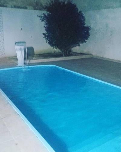 Kolam renang di atau dekat dengan Casa com piscina em Esmeraldas MG