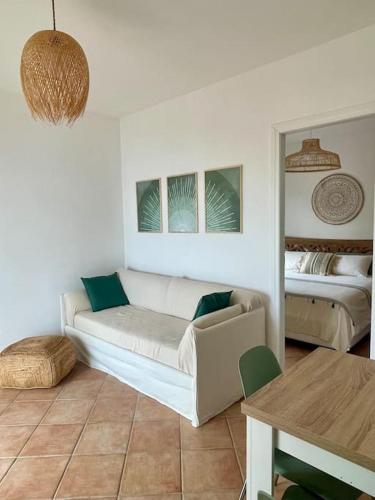 Postel nebo postele na pokoji v ubytování Le Lantane House