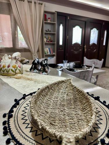 a table with a rug on top of a table at Speranza's Sweet Home in Vrontados