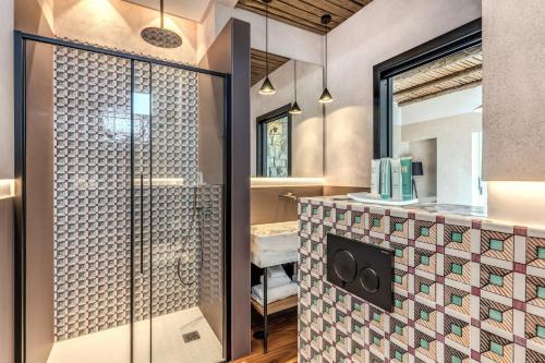a bathroom with a shower and a sink at Casale La Torre Luxury by Feeling Italy in Massa Lubrense