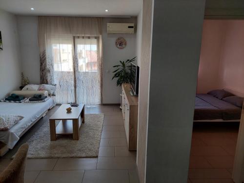 Ένα ή περισσότερα κρεβάτια σε δωμάτιο στο HELA Lux apartment
