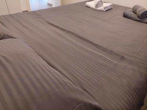 Ένα ή περισσότερα κρεβάτια σε δωμάτιο στο HELA Lux apartment