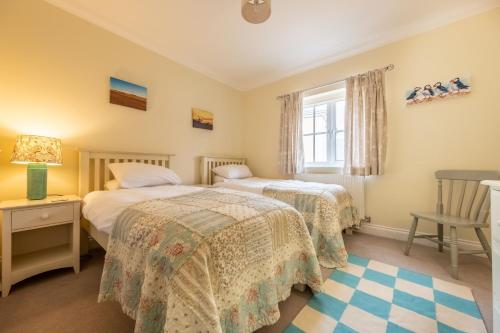 Ένα ή περισσότερα κρεβάτια σε δωμάτιο στο Hectors Hideaway