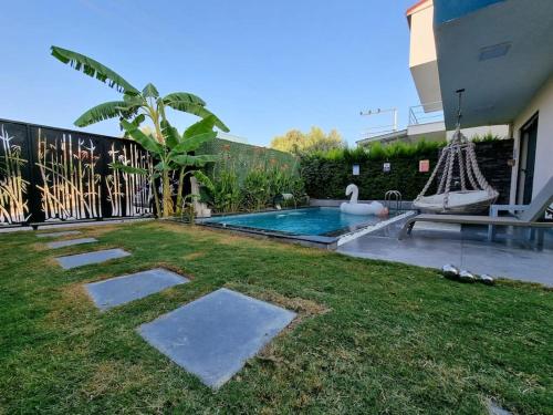 Gallery image of Villa Oyster Park Isıtmalı Yıldız Efektli Çocuk Havuzlu Villa in Aydın
