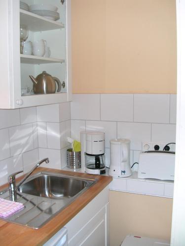 Dapur atau dapur kecil di Gästeträume Im Viertel