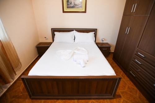 Postel nebo postele na pokoji v ubytování Apartment Darlin Berat