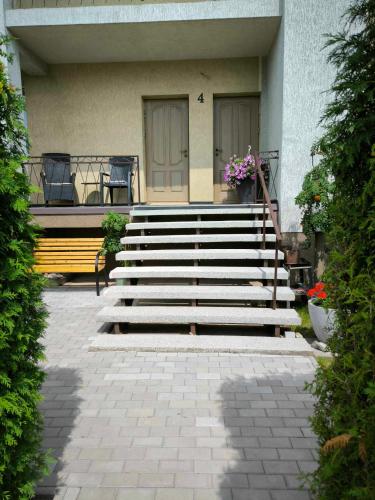 a set of stairs in front of a building at Elpo House in Neveronys