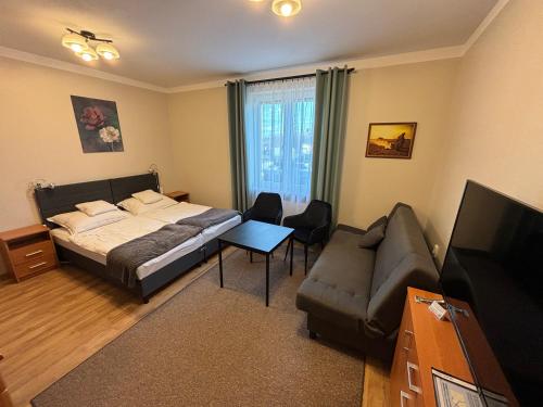 Posteľ alebo postele v izbe v ubytovaní Apartamenty JN Poznań Rzeczna 4