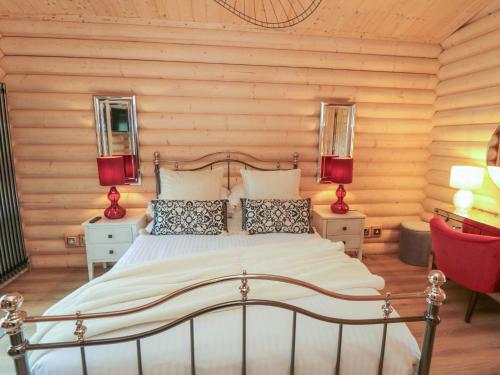 Ένα ή περισσότερα κρεβάτια σε δωμάτιο στο Carlton Lodge 1