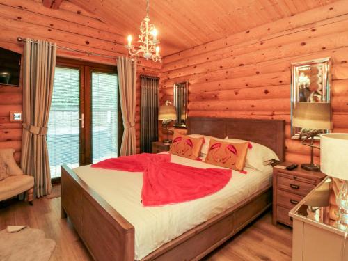 Ένα ή περισσότερα κρεβάτια σε δωμάτιο στο Wainstones Lodge 2