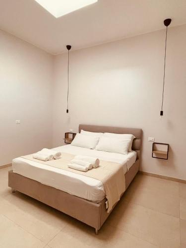 Katil atau katil-katil dalam bilik di Sunrise Apartments