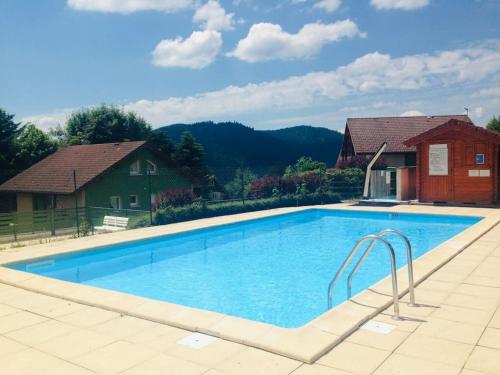 Duplex dans chalet avec superbe vue lac et piscine commune