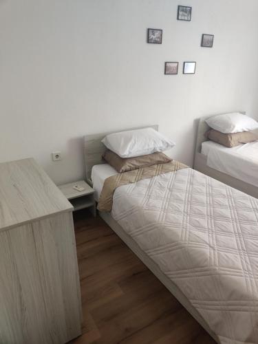Ένα ή περισσότερα κρεβάτια σε δωμάτιο στο Apartment 3 Zdrave