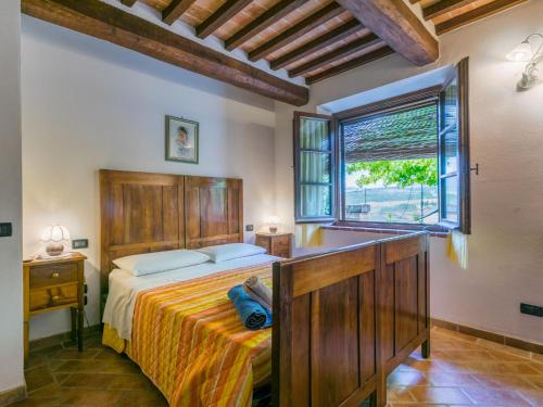 Ένα ή περισσότερα κρεβάτια σε δωμάτιο στο Holiday Home Podere Biancospino by Interhome