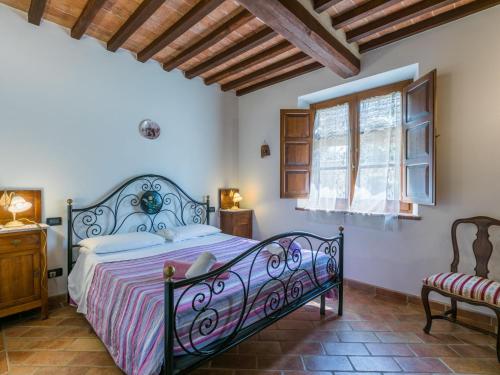 Ένα ή περισσότερα κρεβάτια σε δωμάτιο στο Holiday Home Podere Biancospino by Interhome