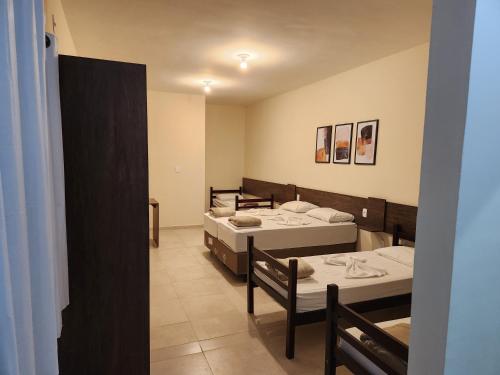 Katil atau katil-katil dalam bilik di O Franciscano Hospedagem