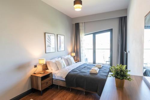 Postel nebo postele na pokoji v ubytování Family-friendly Home Near Taksim Square