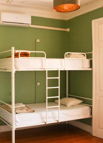 Letto o letti in una camera di Urban Garden Hostel