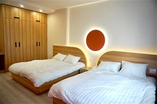 Cama o camas de una habitación en CC Xanh Xanh